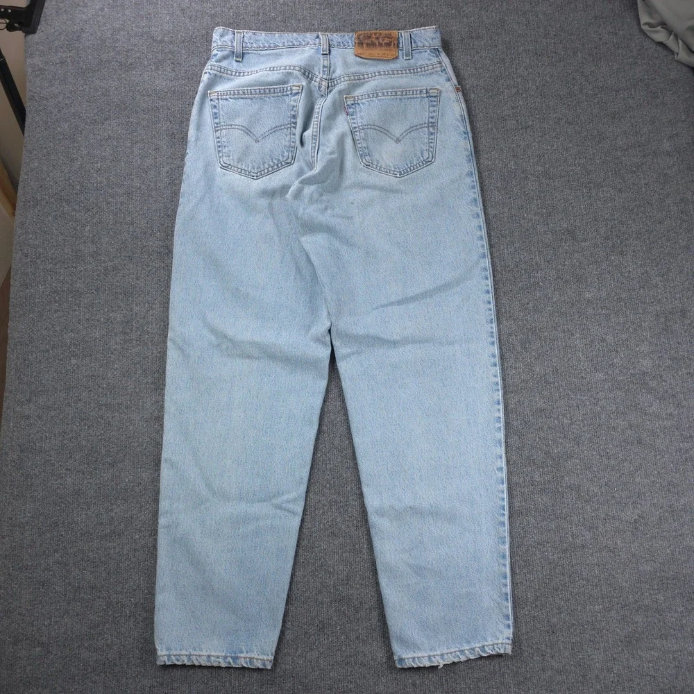 VINTAGE Levis 560 Loose Fit Tapered Leg Jeans Light Wash Blue Mens Denim 34x32
